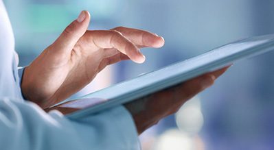 Someone completing an interactive exercise on a tablet