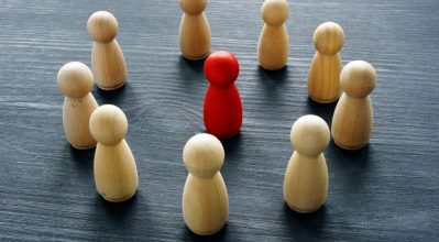 Representation of one person being singled out for being different